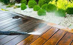 A wooden deck being pressure washing in Vancouver